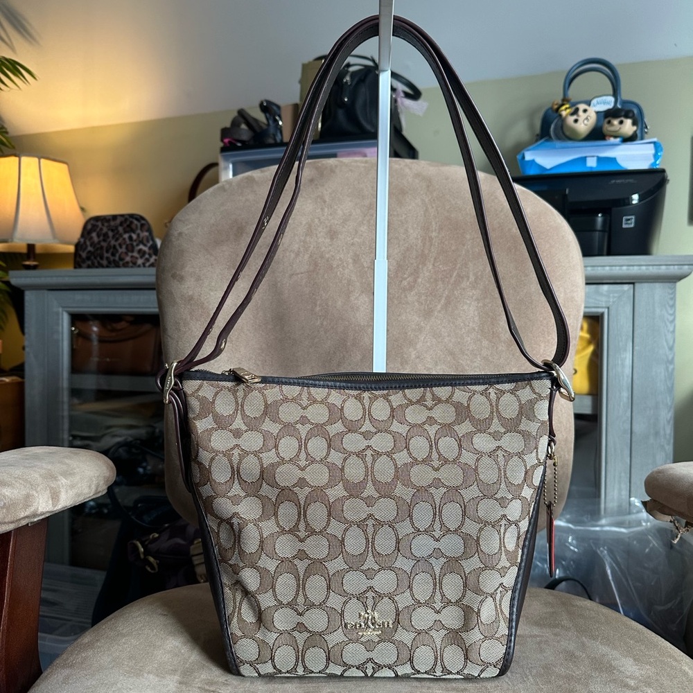 #16. Coach Brown Signature Duffelette 2-way Shoulder Bag, Style 25697